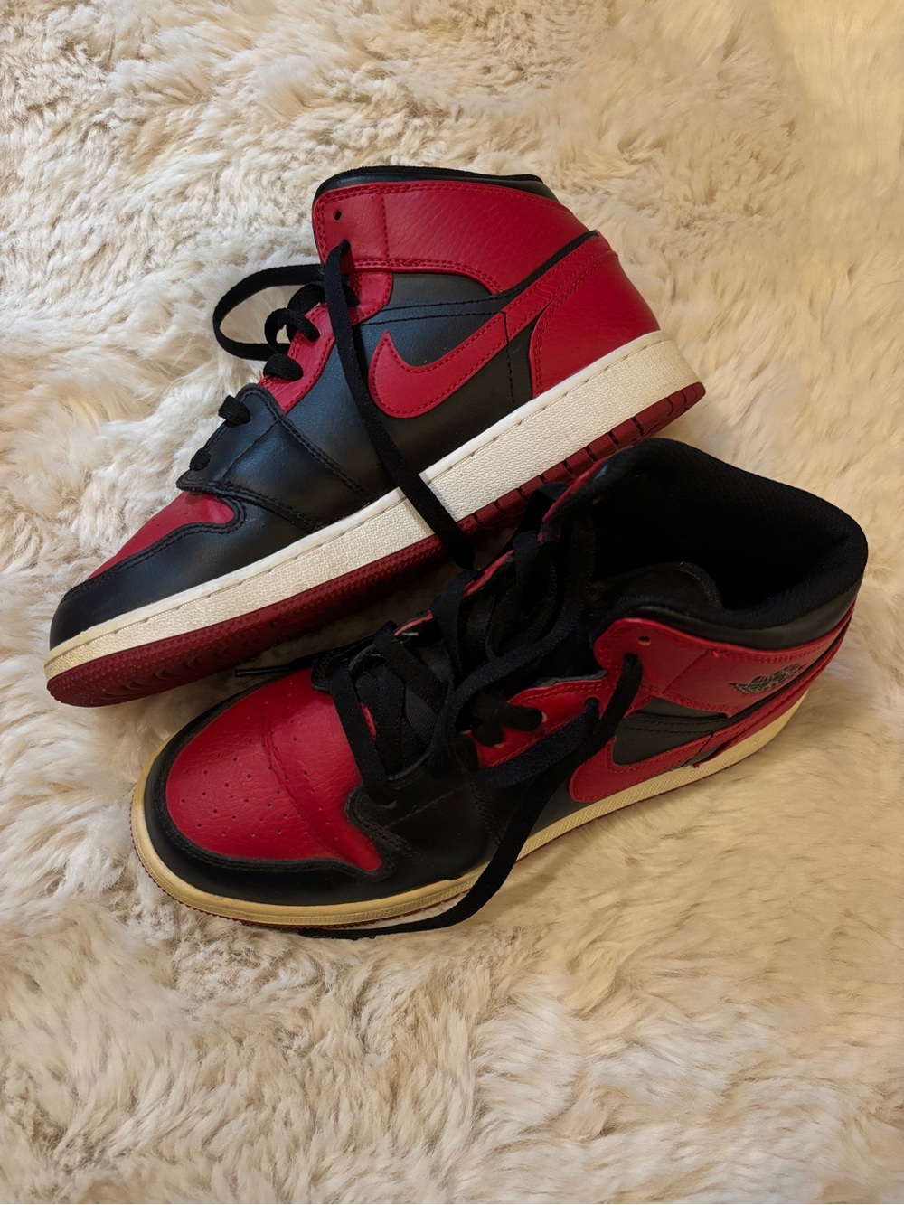6 youth/ 7.5-8 Women’s Red and Black High-Top Nike mid Jordan 1s BANNED